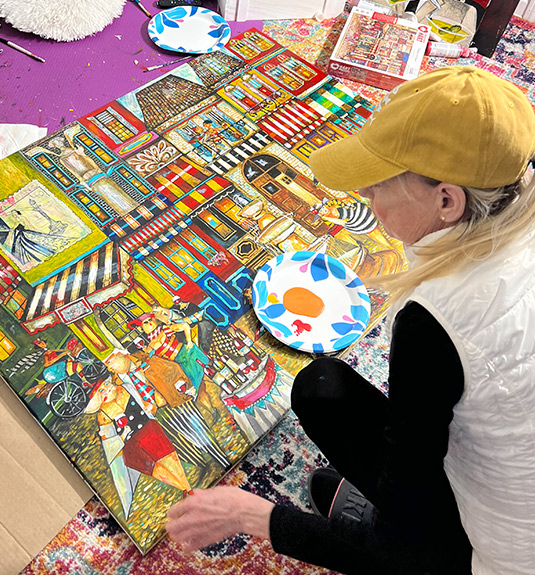 Artist Jennifer Garant painting Days of Wine and Roses.